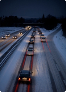 Snow-covered highway during rush-hour